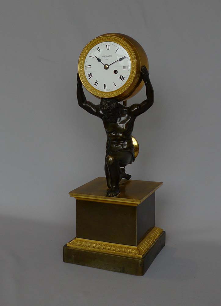 English Regency antique mantel clock,  Atlas holding the world signed Bentley and lBeck 1292.