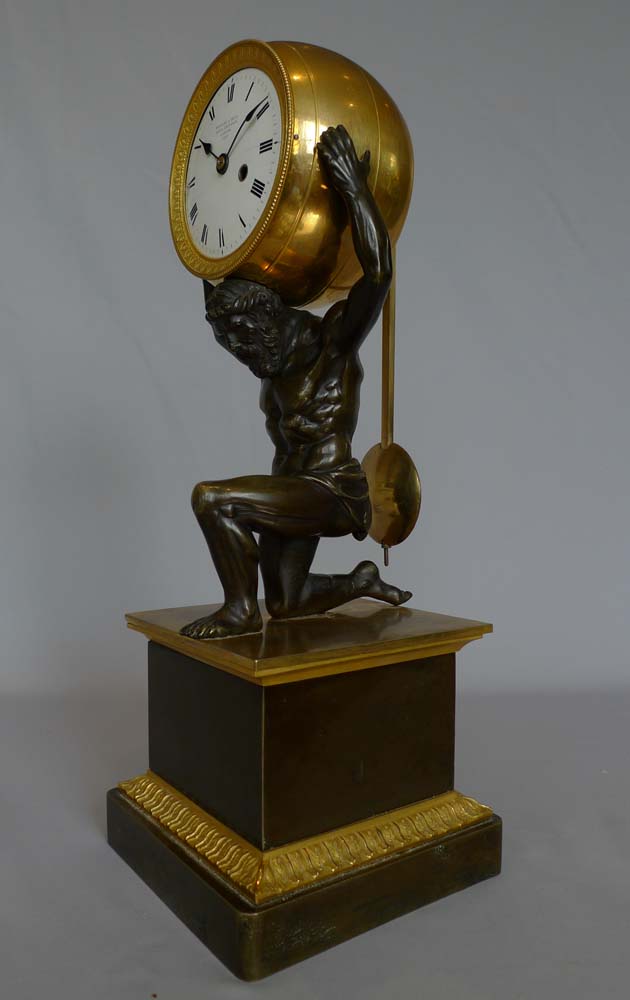 English Regency antique mantel clock,  Atlas holding the world signed Bentley and lBeck 1292.