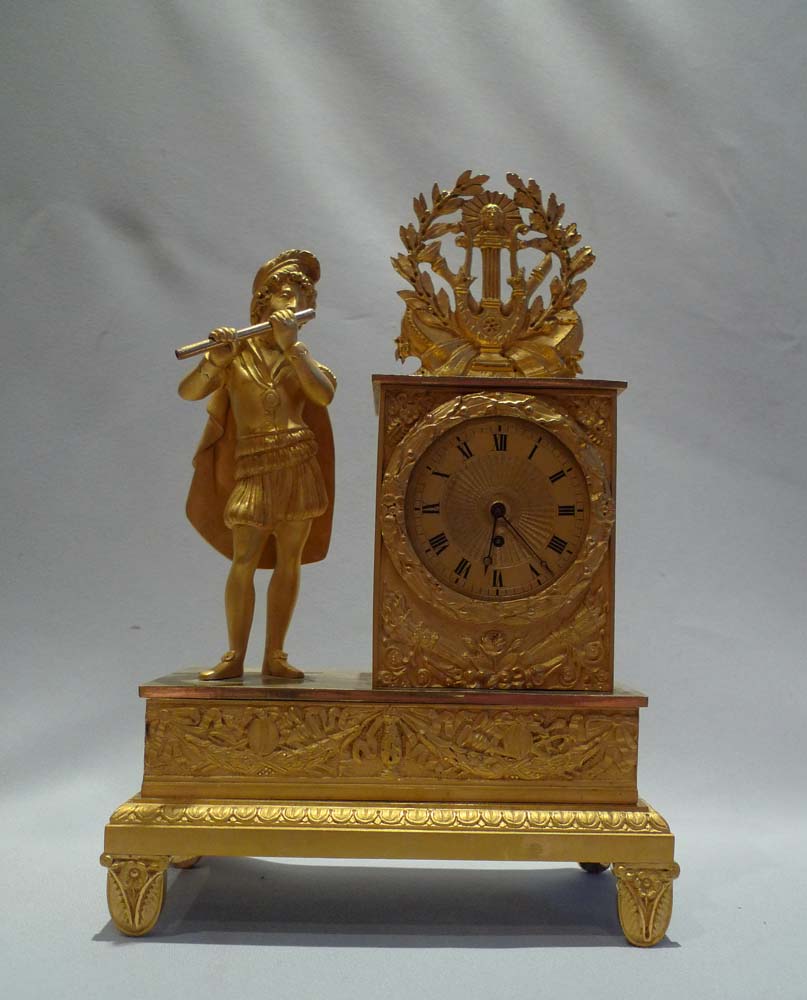 French Empire antique ormolu miniature mantel clock signed Romilly.
