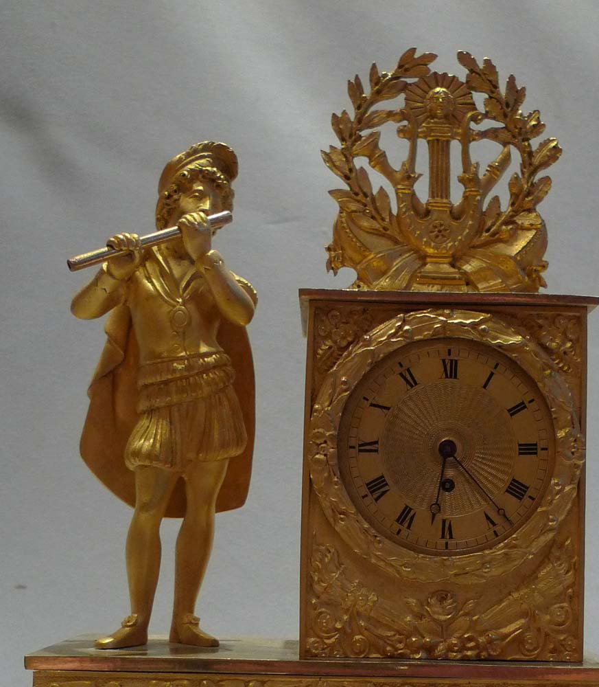 French Empire antique ormolu miniature mantel clock signed Romilly.