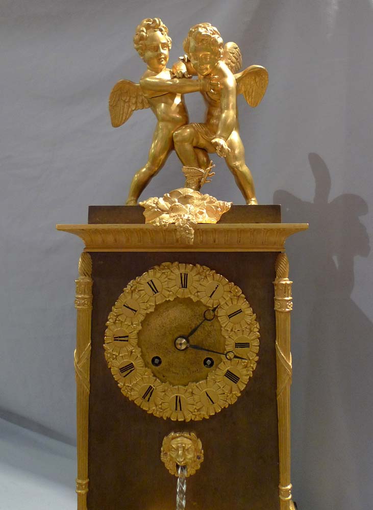Antique French double automaton clock with two children fighting over a butterfly & water feature.
