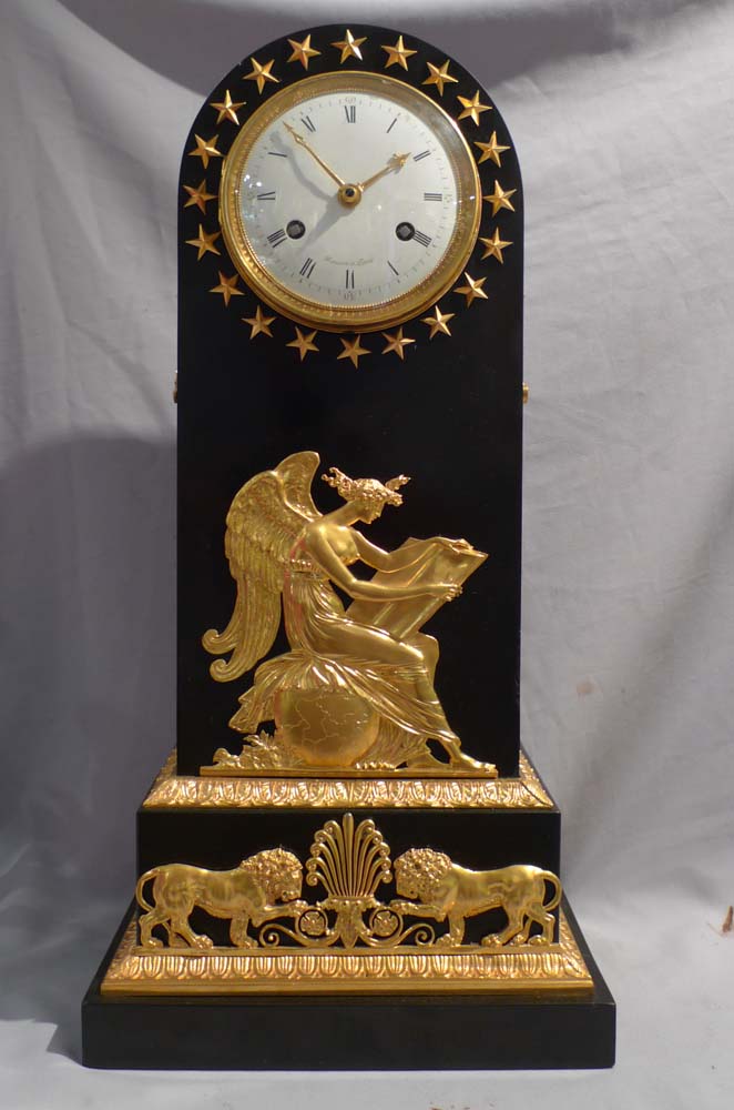 French Empire antique black marble and ormolu borne clock by Maniere
