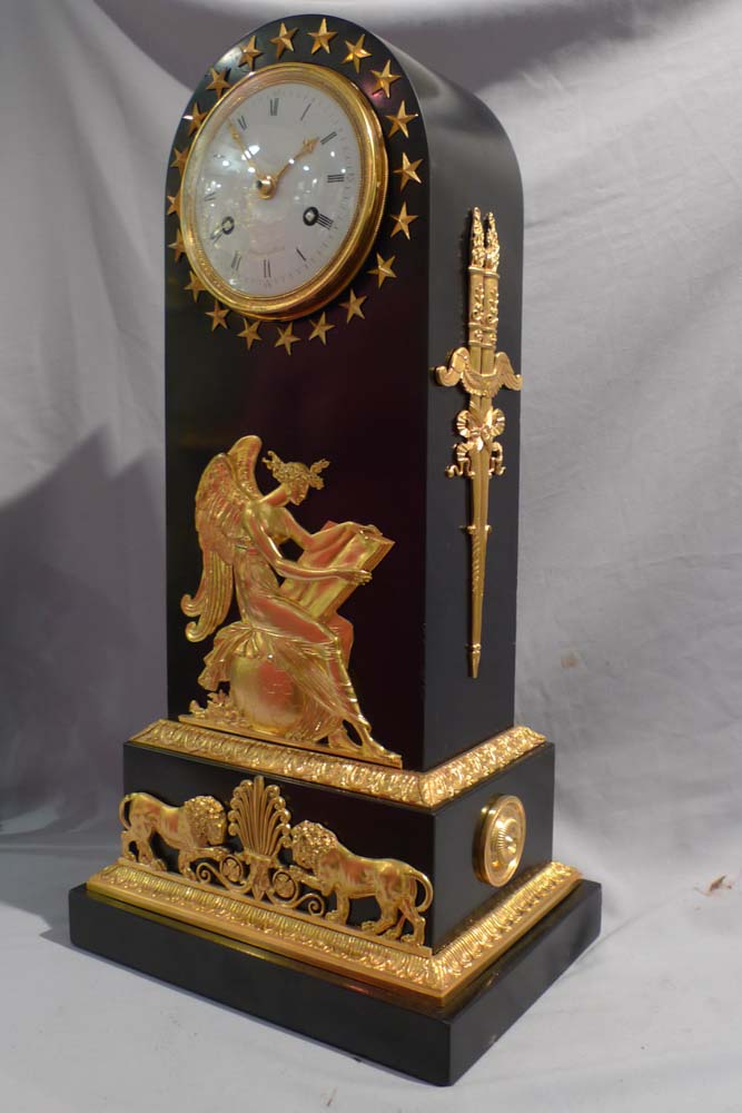 French Empire antique black marble and ormolu borne clock by Maniere