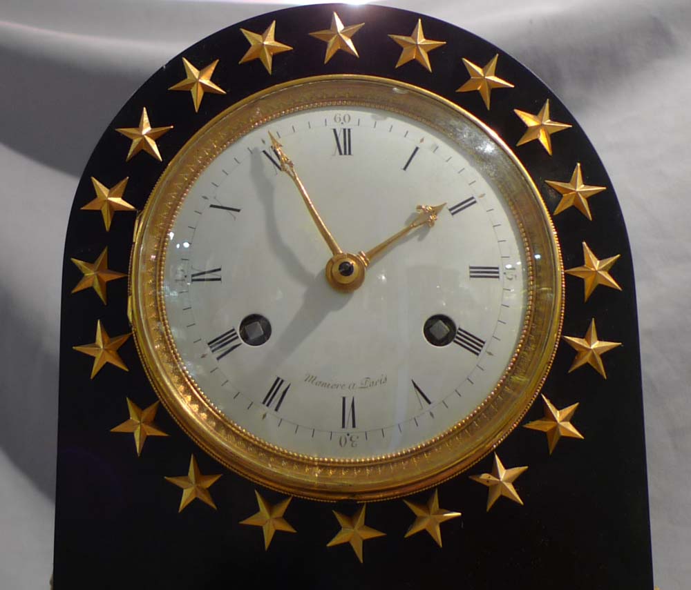 French Empire antique black marble and ormolu borne clock by Maniere
