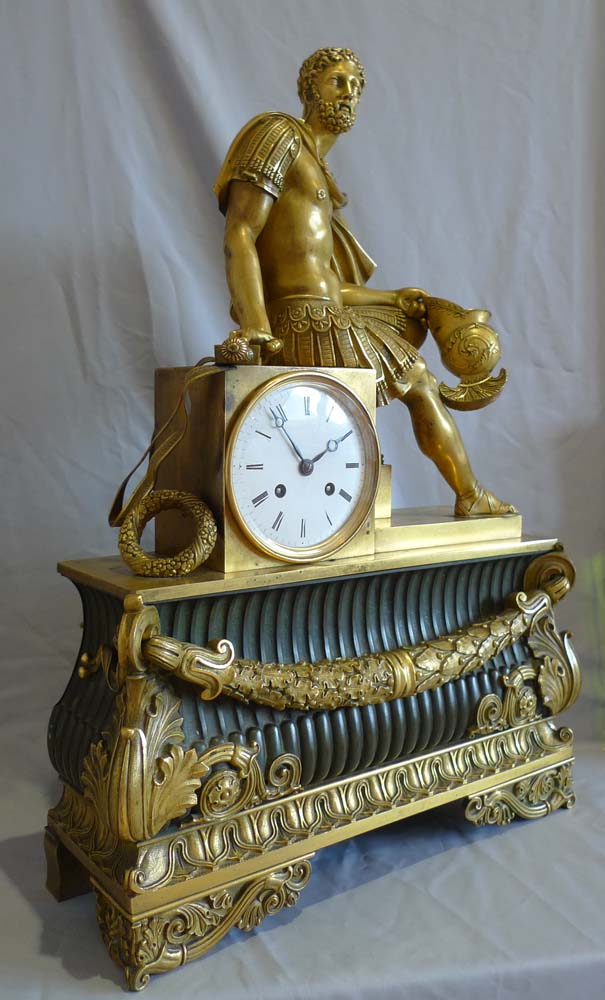 Antique French mantel clock Charles X  of Marcus Aurelius in ormolu and patinated bronze.