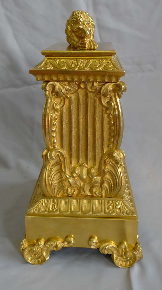 Antique ormolu French mantel clock surmounted by Lion.