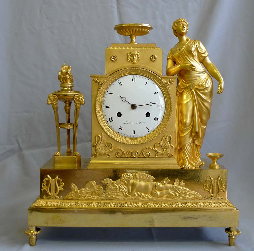 Antique French Empire mantel clock in ormolu signed Lachere.