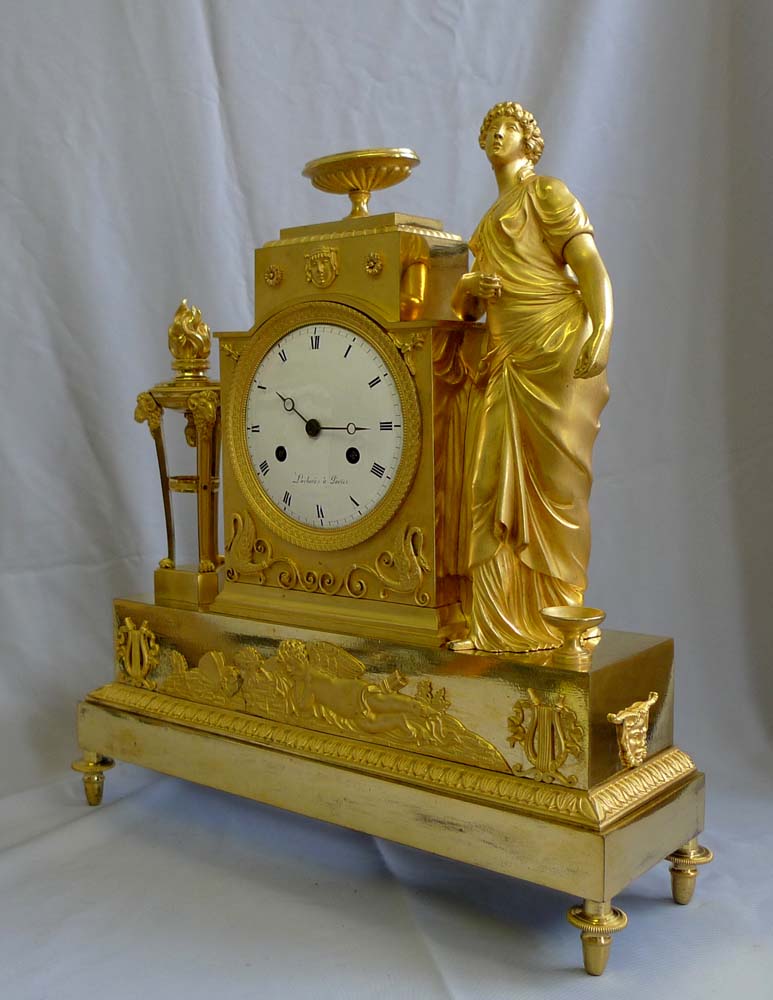 Antique French Empire mantel clock in ormolu signed Lachere.