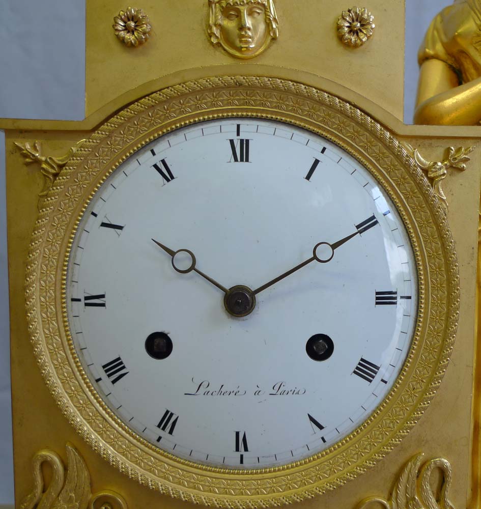 Antique French Empire mantel clock in ormolu signed Lachere.