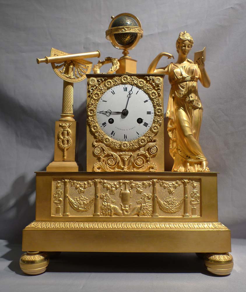 French Empire antique ormolu mantel clock of Astronomy signed Cartier.