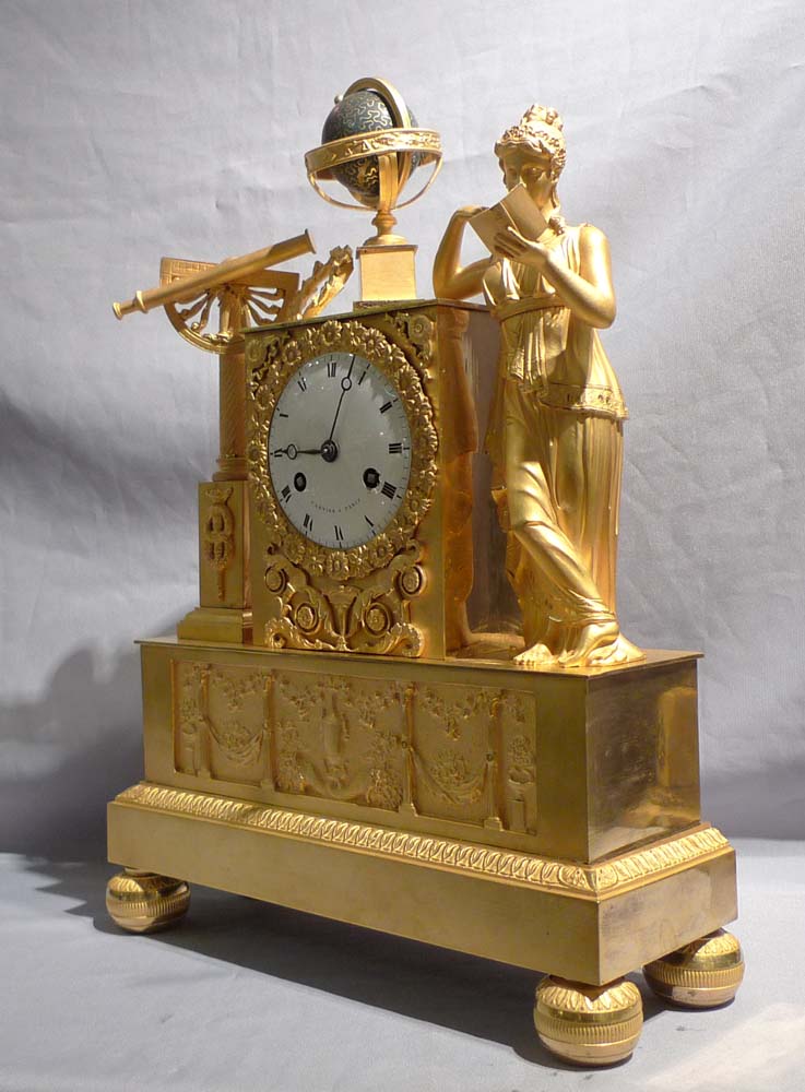 French Empire antique ormolu mantel clock of Astronomy signed Cartier.