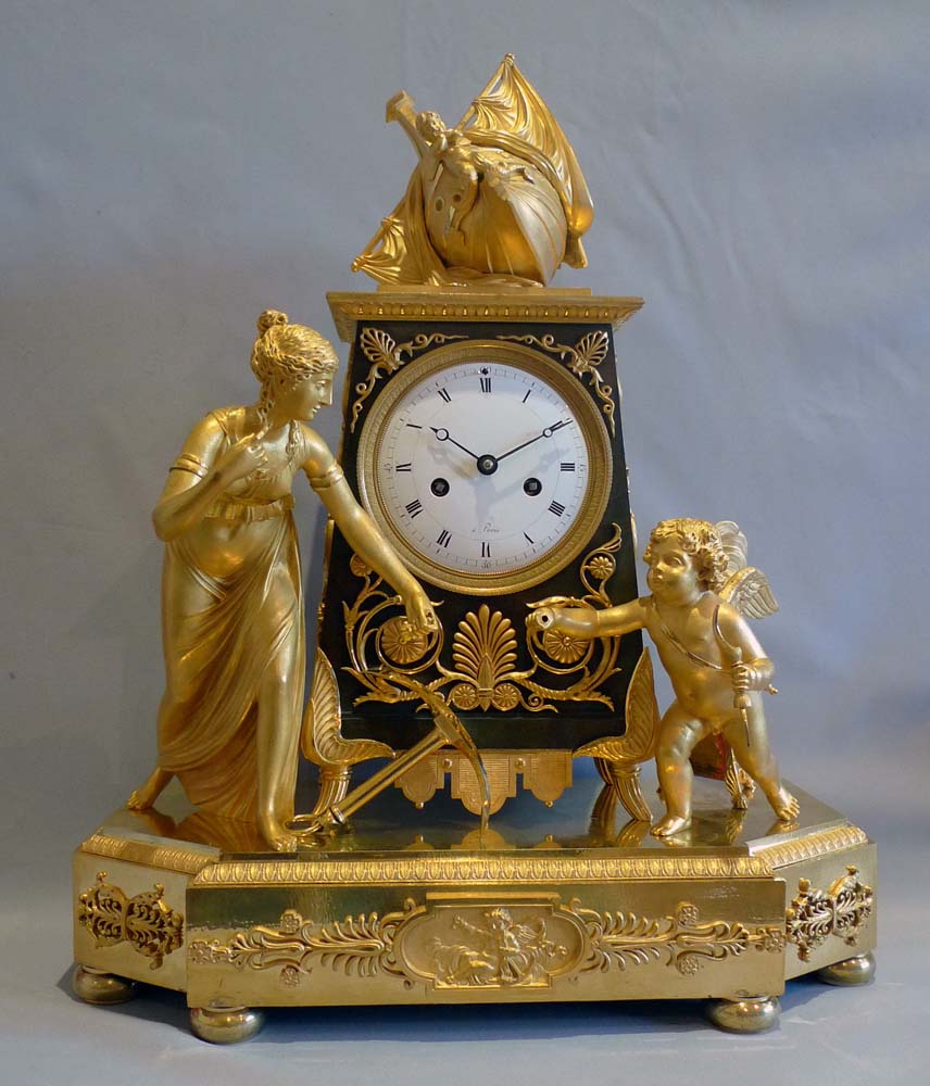 Antique French Empire ormolu mantel clock of Hope overcoming despair.
