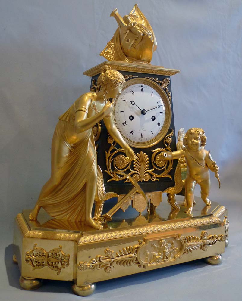 Antique French Empire ormolu mantel clock of Hope overcoming despair.