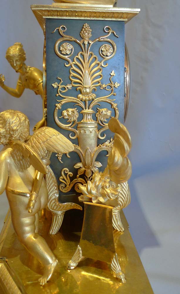 Antique French Empire ormolu mantel clock of Hope overcoming despair.