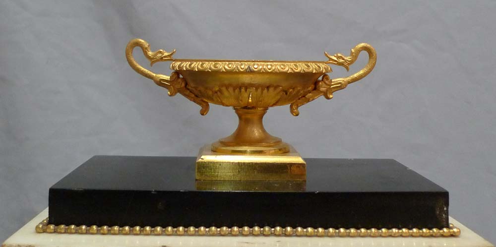 Antique French Directoire marble and ormolu mantel clock.