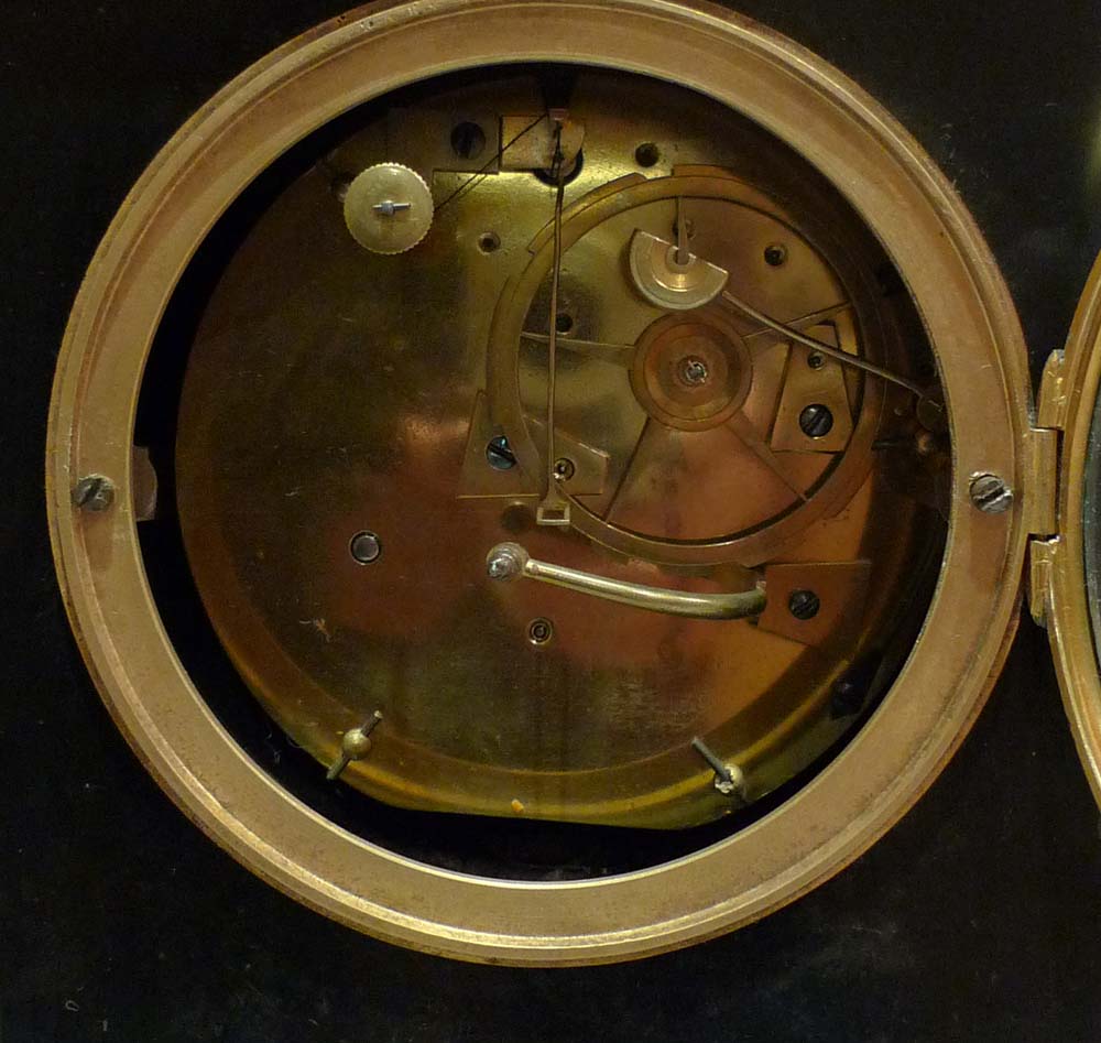 Antique French Directoire marble and ormolu mantel clock.
