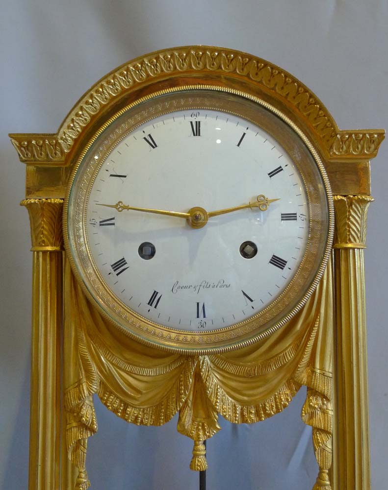 Antique French Directoire ormolu mantel clock signed Coeur et Fils a Paris and dated 1804.