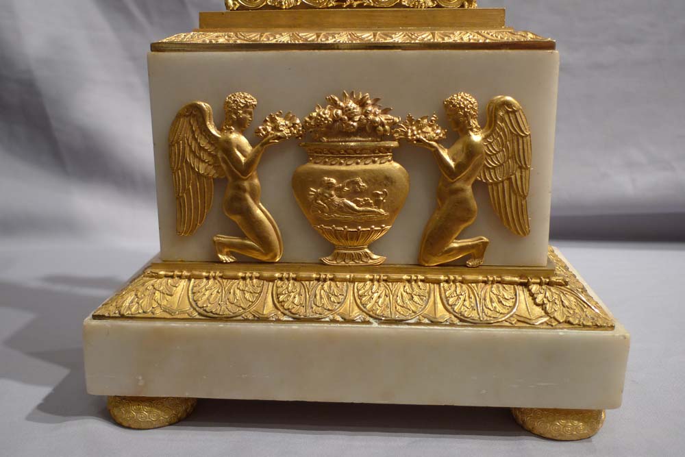 Antique French Charles X ormolu and alabaster lyre clock.
