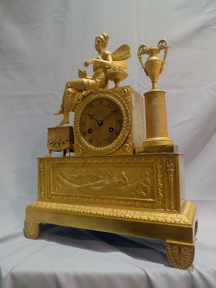 Antique ormolu French Charles X mantel clock of winged Psyche.
