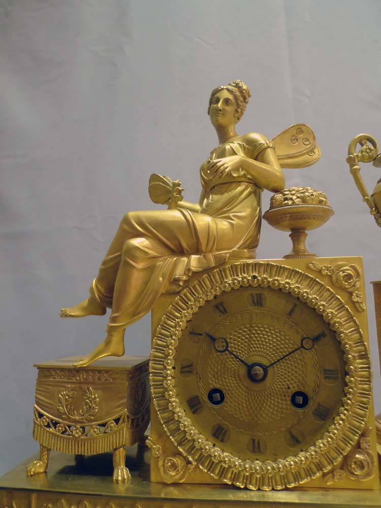 Antique ormolu French Charles X mantel clock of winged Psyche.