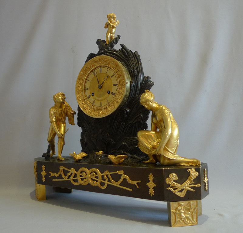 Antique French Charles X ormolu and patinated bronze Arcadian genre mantel clock.