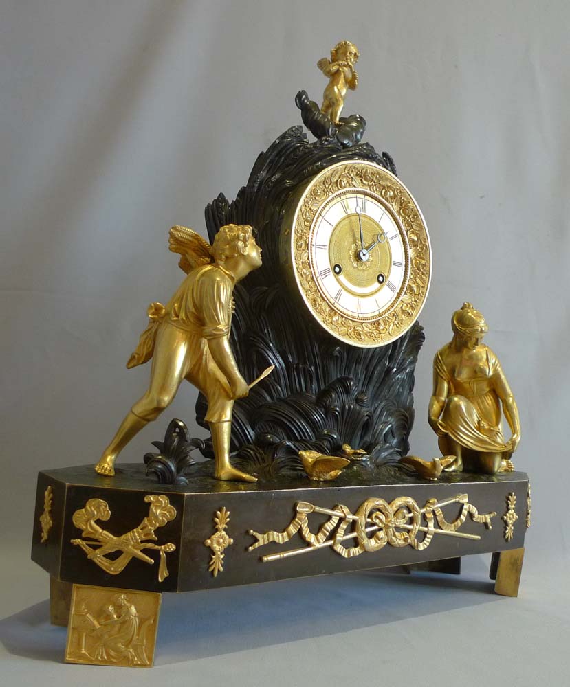 Antique French Charles X ormolu and patinated bronze Arcadian genre mantel clock.