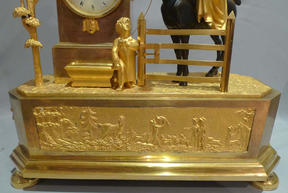 Antique French Empire Genre mantel clock of an Arcadian hunting scene.