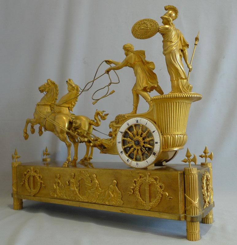 French Empire antique mantel clock of Minerva riding the chariot of Diomedes.