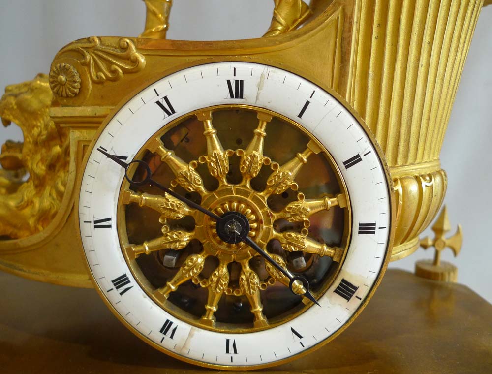 French Empire antique mantel clock of Minerva riding the chariot of Diomedes.