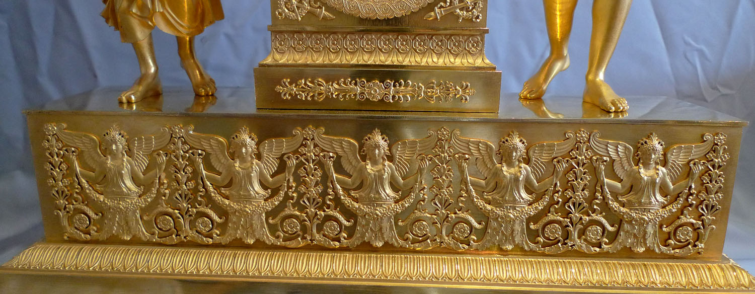 Antique French Empire clock of Psyche and Cupid signed by L.Ravrio bronzier a Paris and Mesnil Hr.
