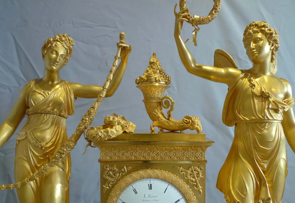 Antique French Empire clock of Psyche and Cupid signed by L.Ravrio bronzier a Paris and Mesnil Hr.