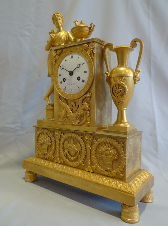 Antique ormolu French Empire clock celebrating viticulture with Cupid and signed Viret a Paris.