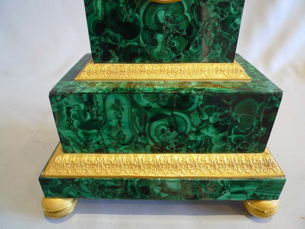 Antique Russian malachite and gilt bronze mantel clock.
