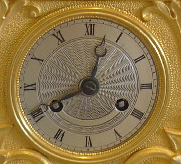 Antique French Greek Revolutiom ormolu mantel clock.