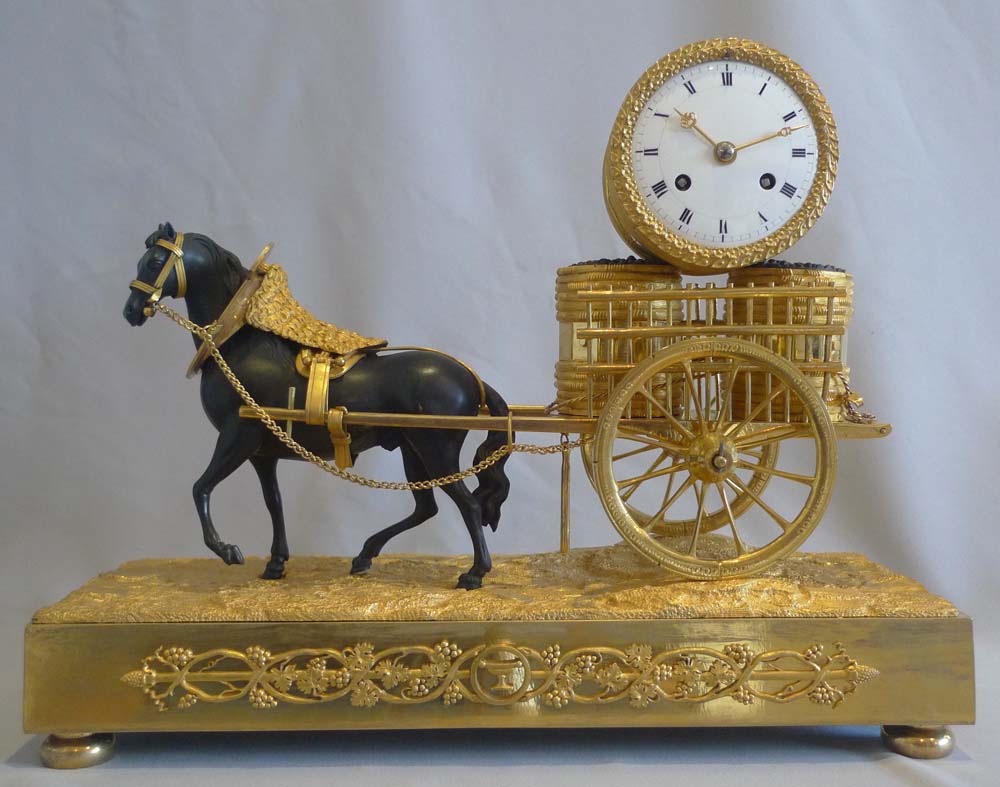 French Empire viticulture genre related mantel clock of horse pulling grapes