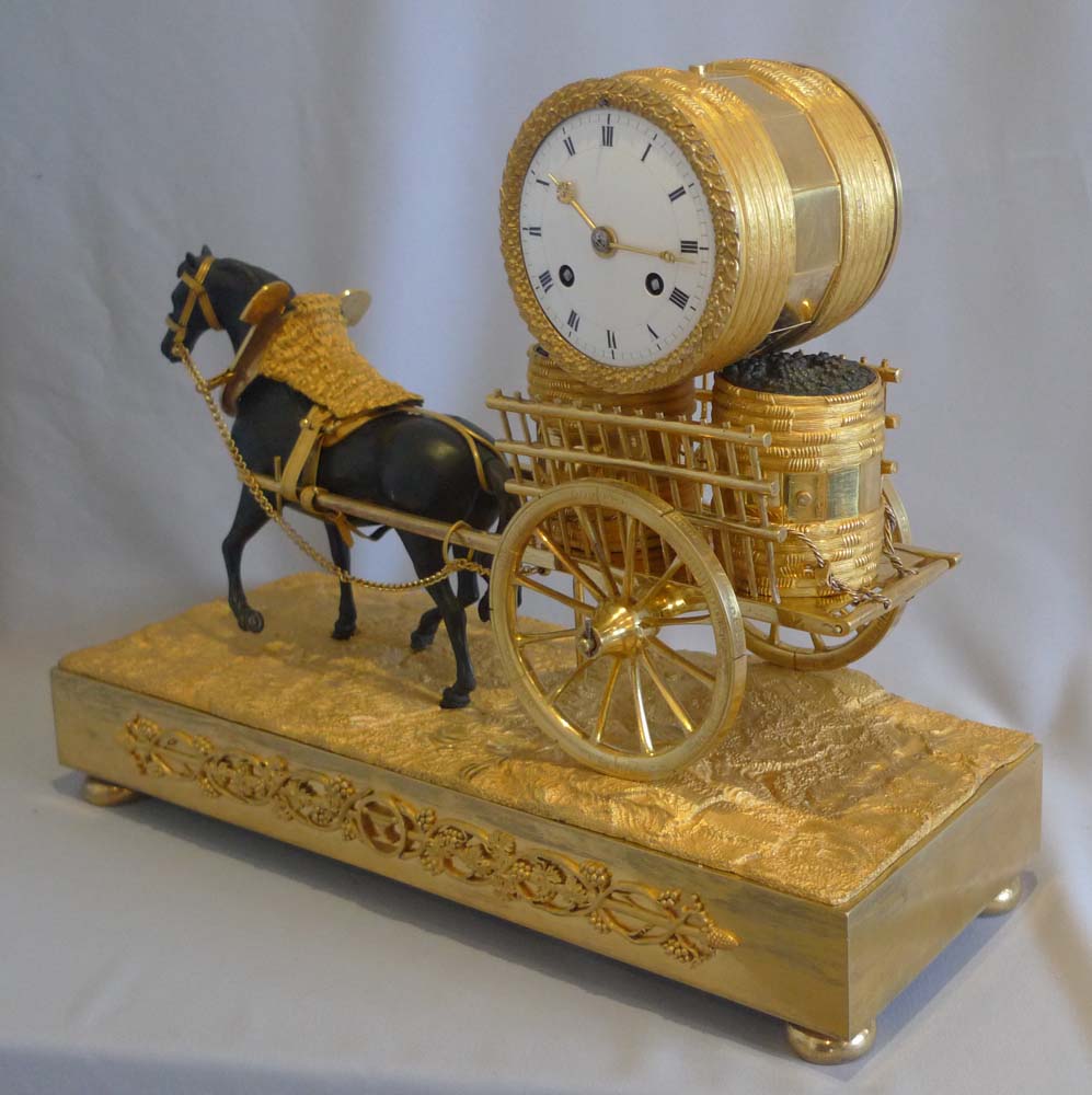 French Empire viticulture genre related mantel clock of horse pulling grapes