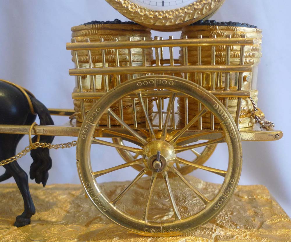 French Empire viticulture genre related mantel clock of horse pulling grapes