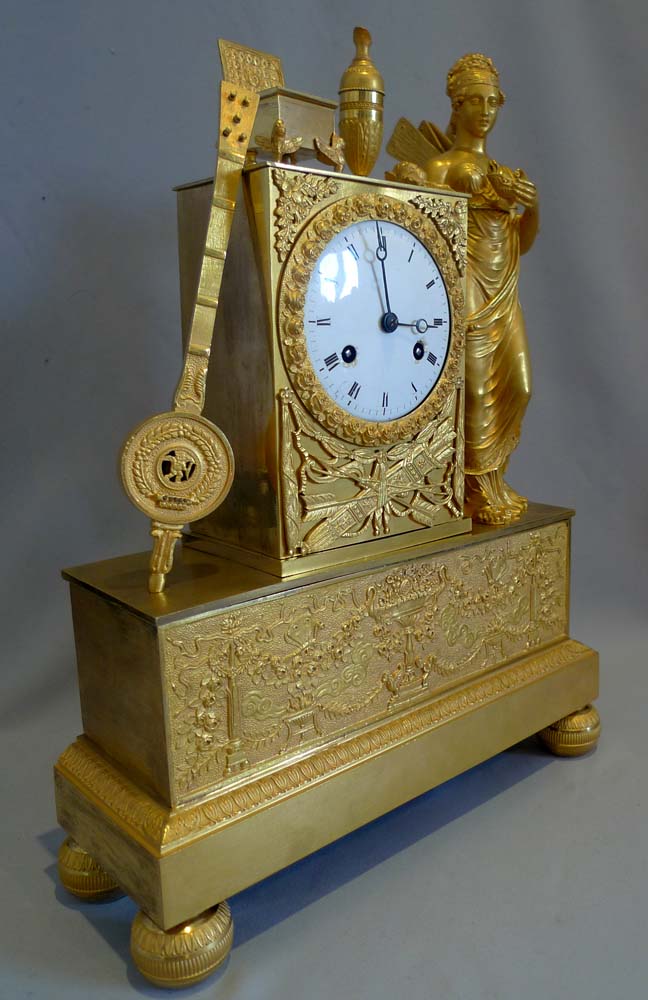 Antique French Empire ormolu clock of a Nike