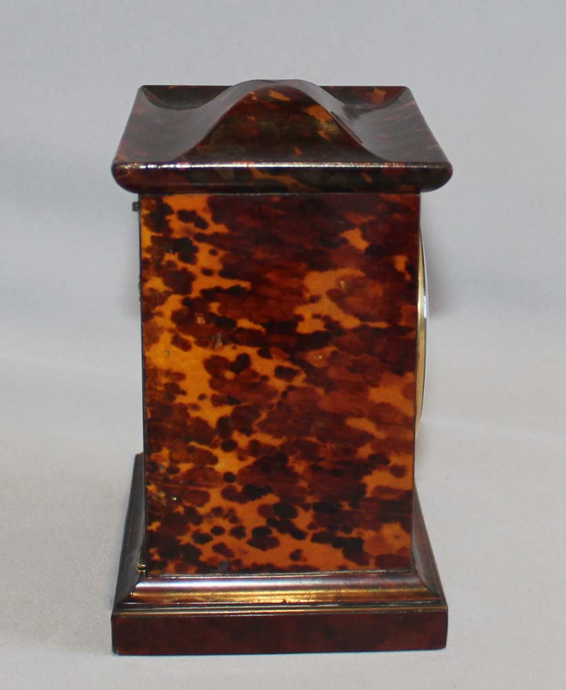 English late Regency antique miniature fusee carriage clock in tortoiseshell veneered case.