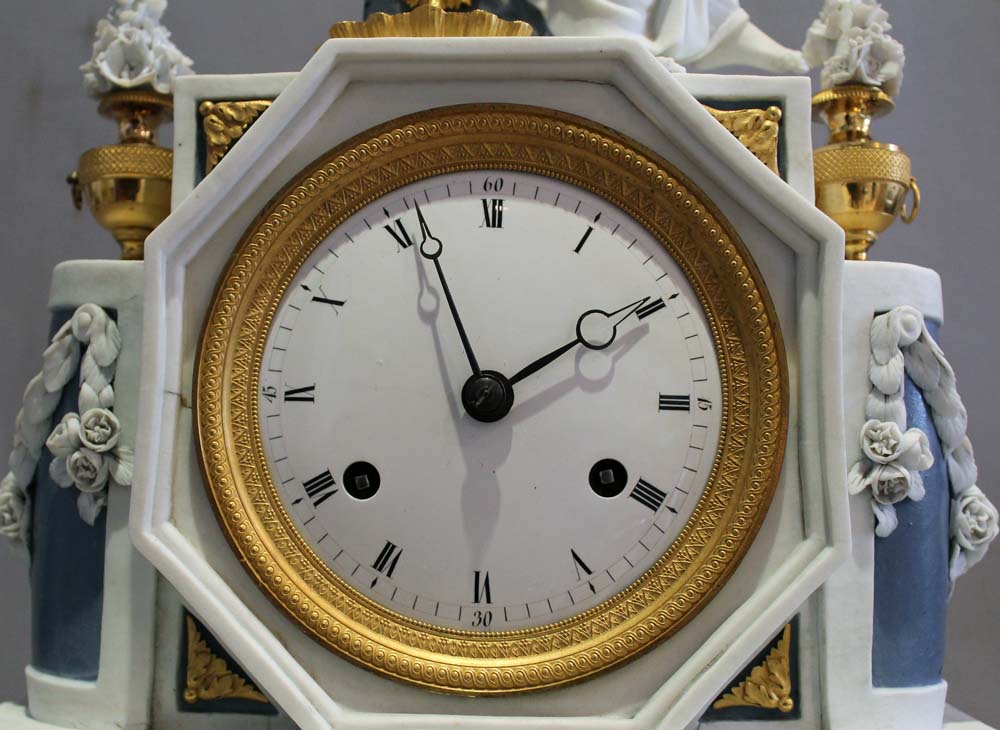 Antique French Directoire period bisque and ormolu mantel clock depicting Ariadne.
