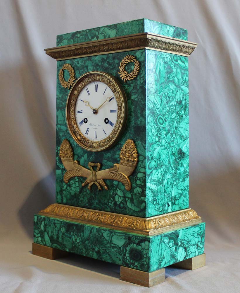Malachite clock with rare movement by Rodier Hr a Paris.