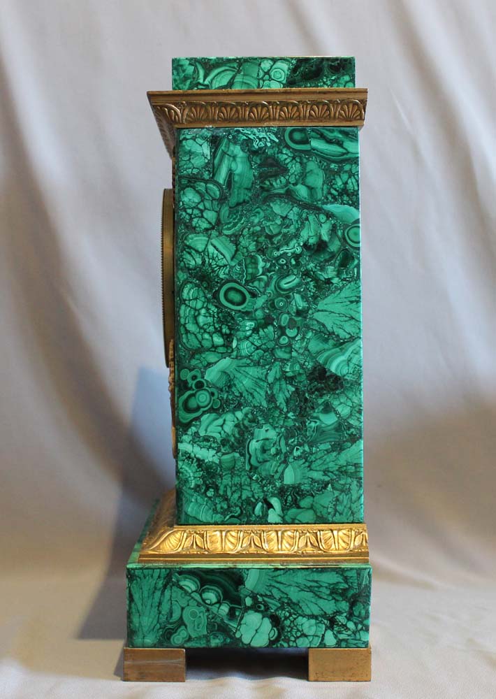 Malachite clock with rare movement by Rodier Hr a Paris.