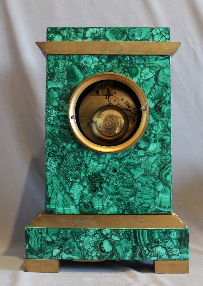 Malachite clock with rare movement by Rodier Hr a Paris.