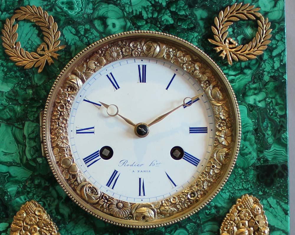 Malachite clock with rare movement by Rodier Hr a Paris.