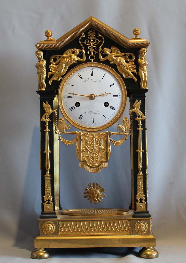 Antique French Empire ormolu and patinated bronze portico clock N. Jennart, Brussels.
