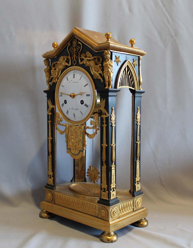 Antique French Empire ormolu and patinated bronze portico clock N. Jennart, Brussels.