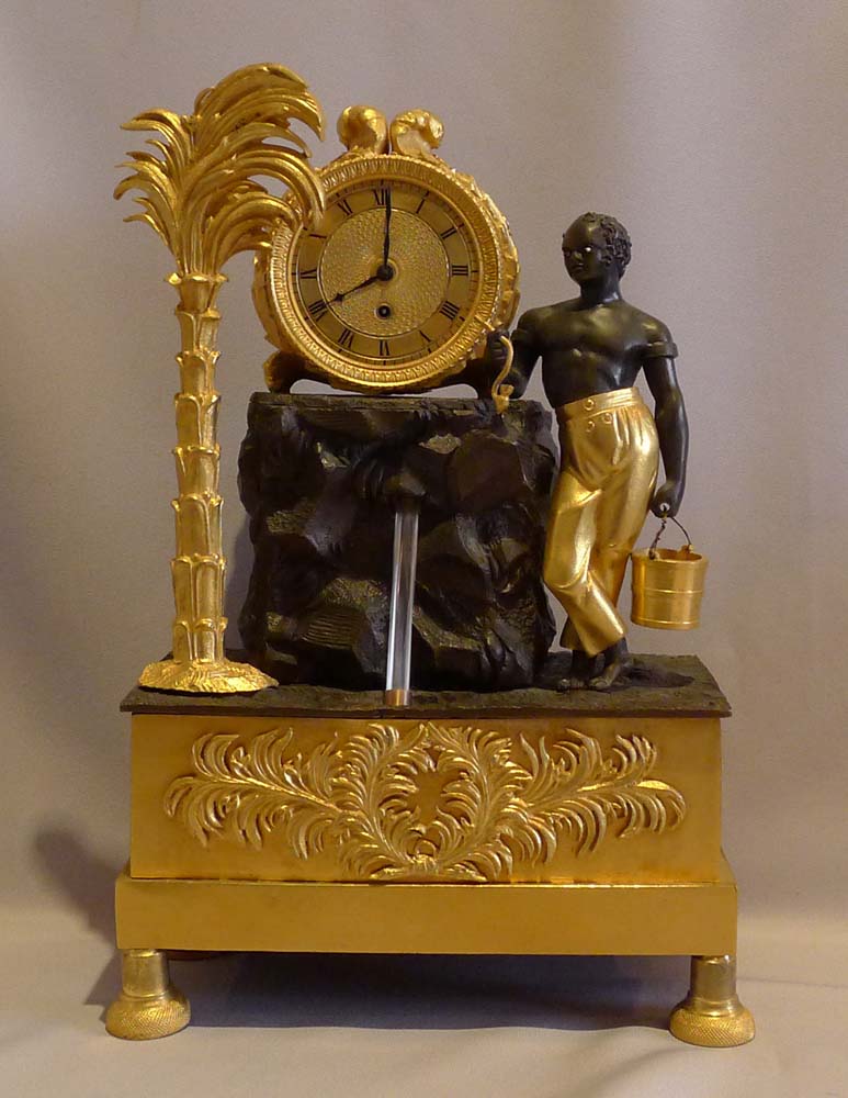 French Empire ormolu and bronze automaton Blackamoor and fountain mantle clock