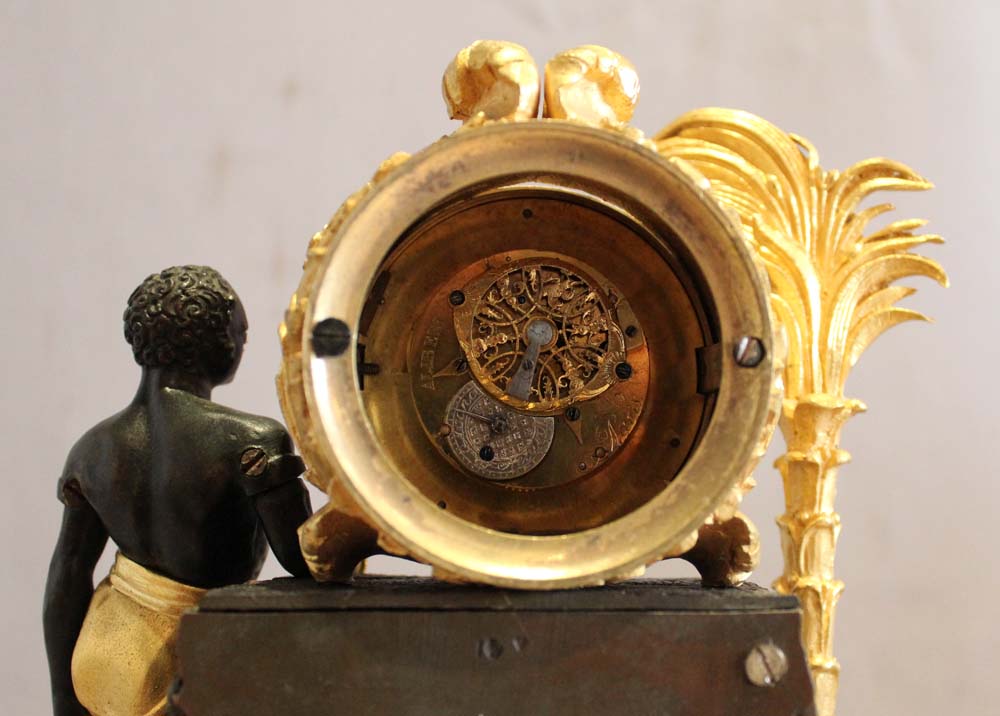 French Empire ormolu and bronze automaton Blackamoor and fountain mantle clock