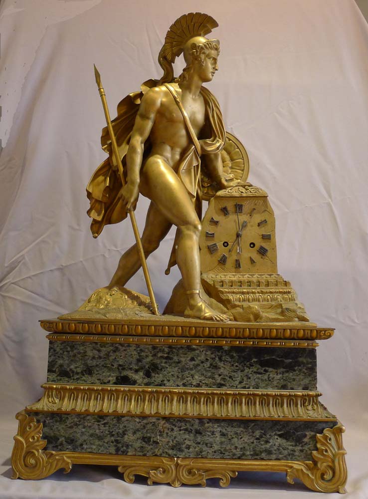 Antique French marble and ormolu mantel clock of a Greek warrior.