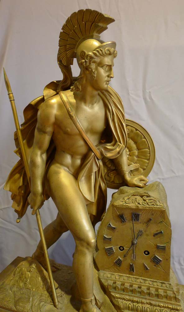 Antique French marble and ormolu mantel clock of a Greek warrior.